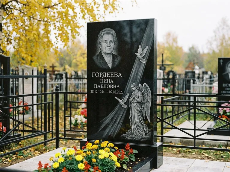 Памятник с гравировкой ангела — гравировка ангела с голубем по диагонали стелы, работа «Гордеева» в Барнауле